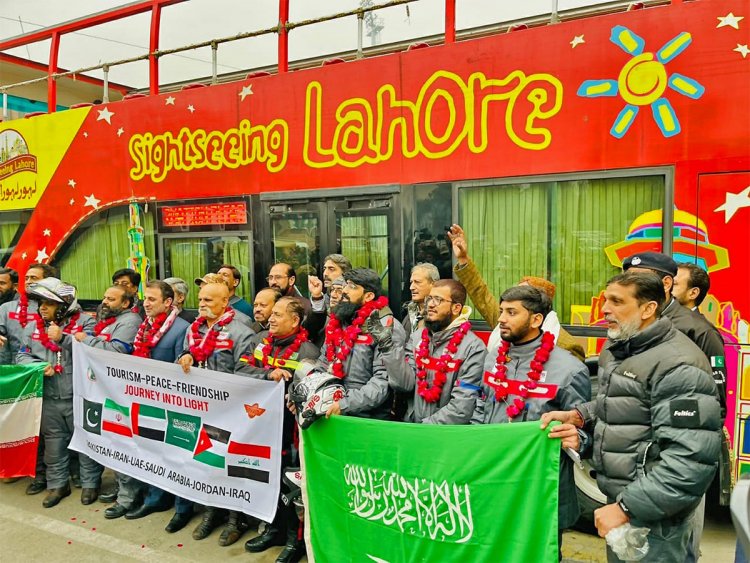 Pakistani bikers posing for a photo in Lahore as they start their Journey on January 6, 2023